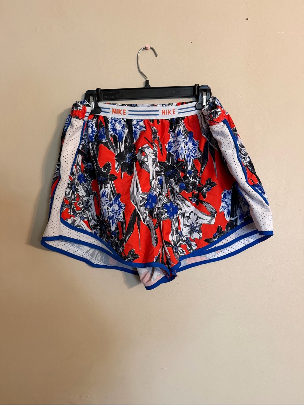 Nike Women’s orange Floral Running Shorts